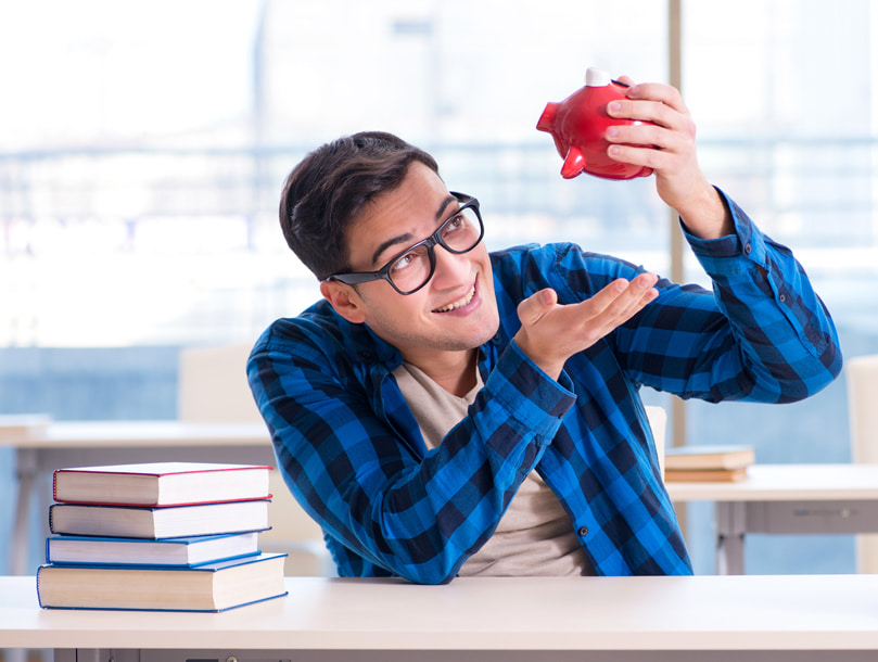 man holding piggybank