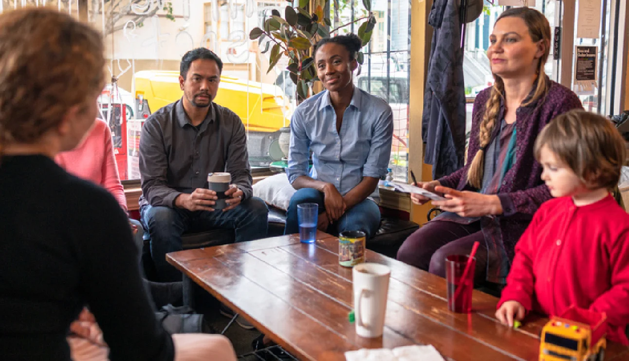 Adults sitting while talking