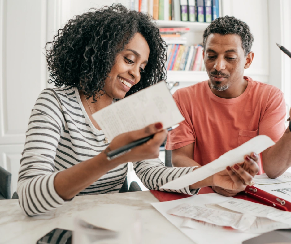 couple reading papers