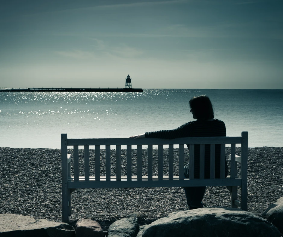 woman alone in front of the beach