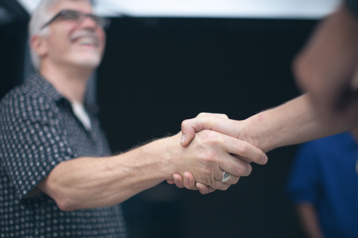 man shaking hands